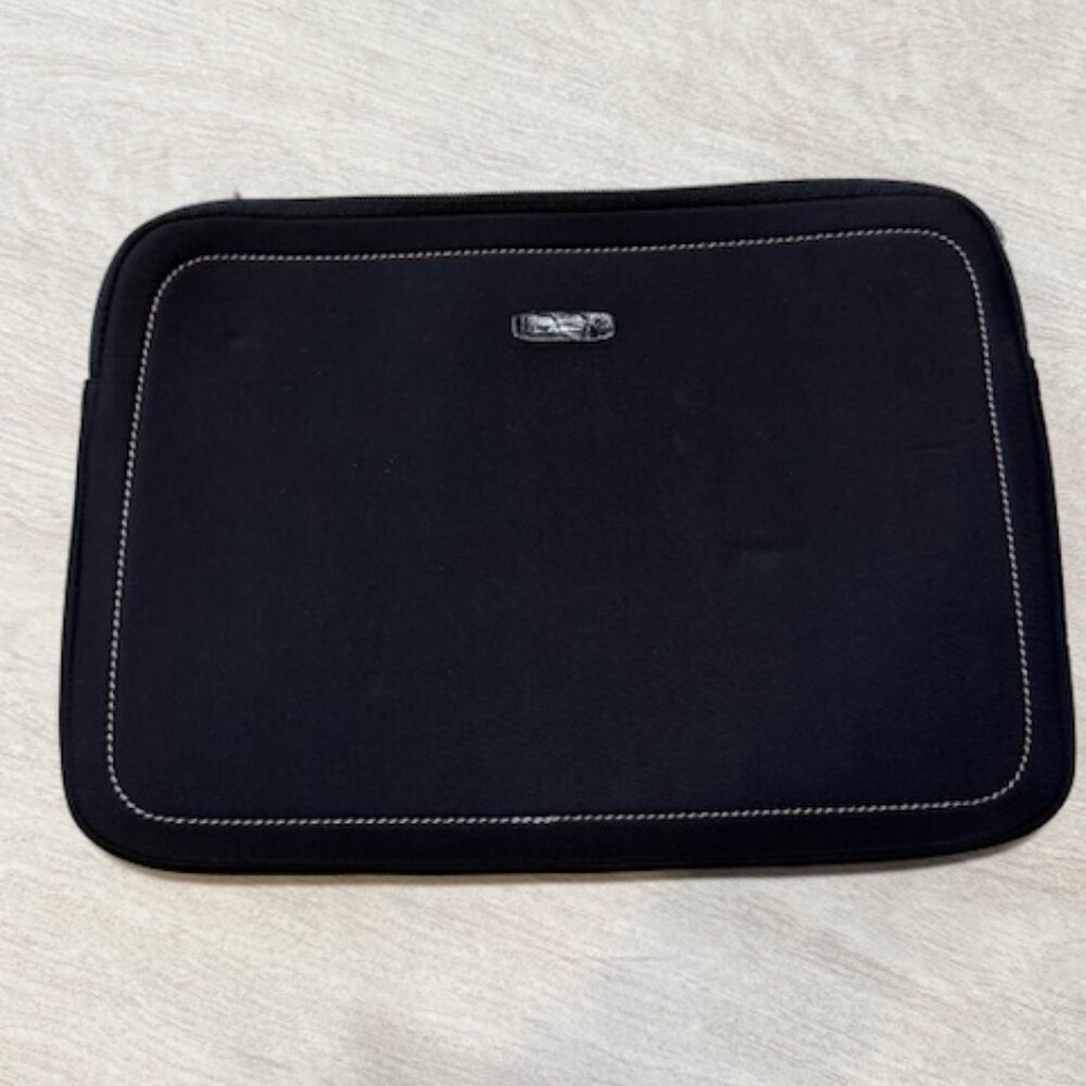 Tumi laptop sleeve.